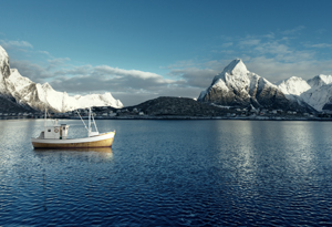 A boat with snowy mountains scenery